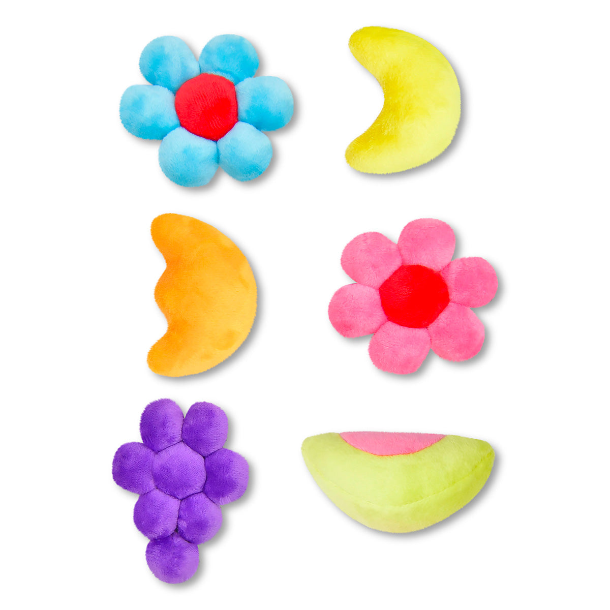 Six Trix fruity shape plushies including flowers, moons, grapes and a melon slice