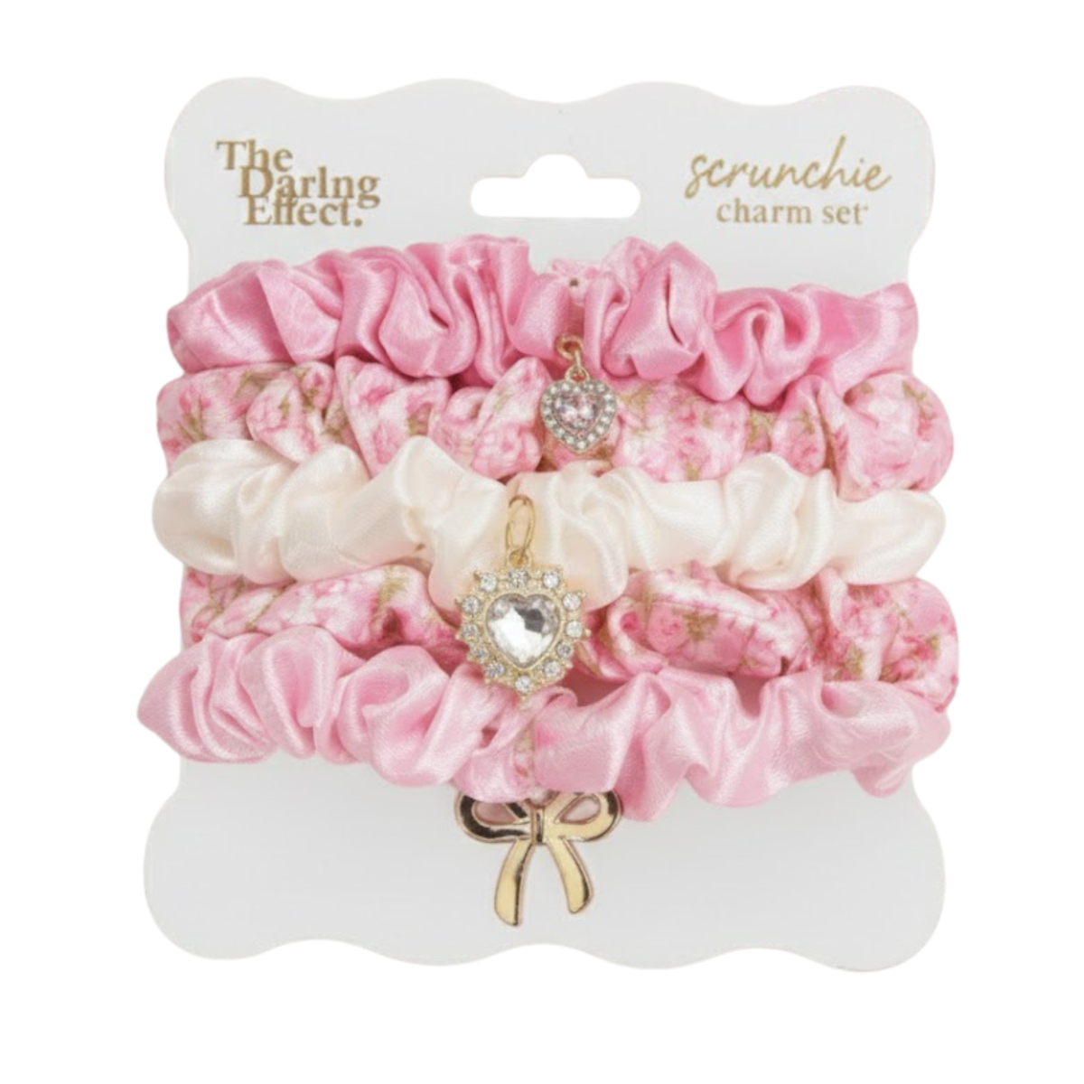 Pink scrunchie charm set on a card with five scrunchies and heart and bow charms