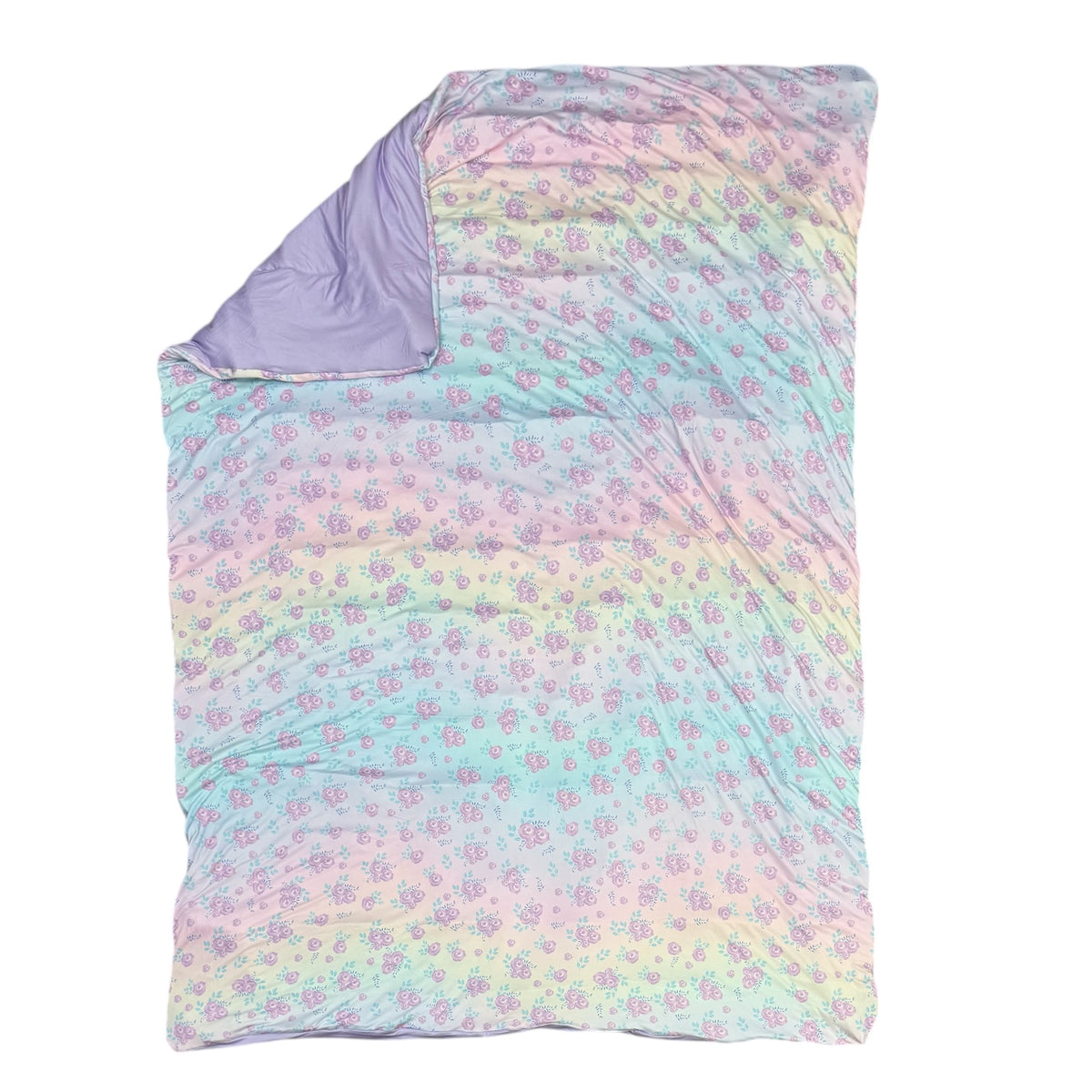 Blushing Blossoms reversible camp comforter laid flat, pastel rainbow roses with a lavender reverse side