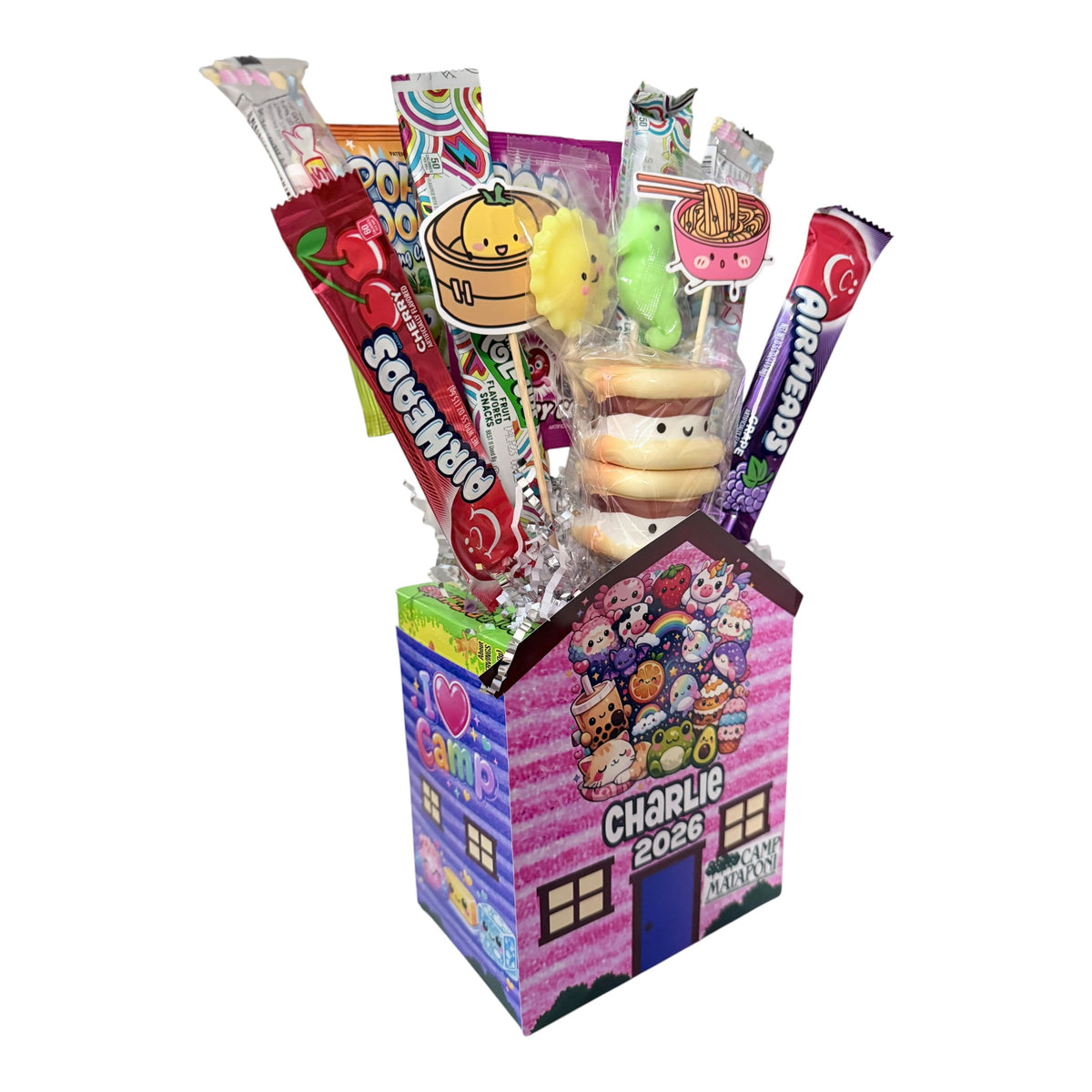 Squish Shack Candy Cabin personalized visiting day gift with colorful candy treats, mirror ball lollipops and camp-themed goodies bursting from decorative house-shaped box