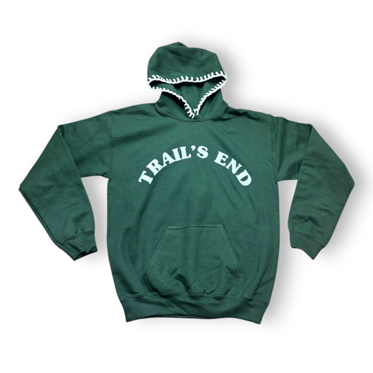 Forest green Happy Days camp hoodie with upside-down white TRAIL'S END lettering and whipstitch hood detail laying flat on white background