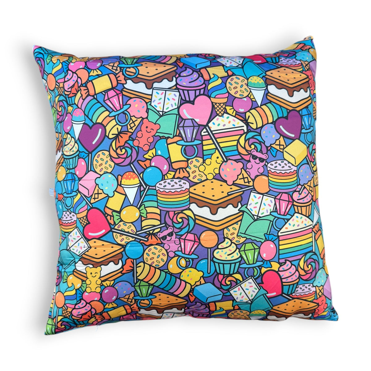 Lemme See You Tootsie Roll autograph pillow with colorful candy pattern featuring s'mores, lollipops, gummy bears, ice cream cones, cookies, cupcakes, hearts, and sweet treats in bright blue, pink, purple, yellow, and orange