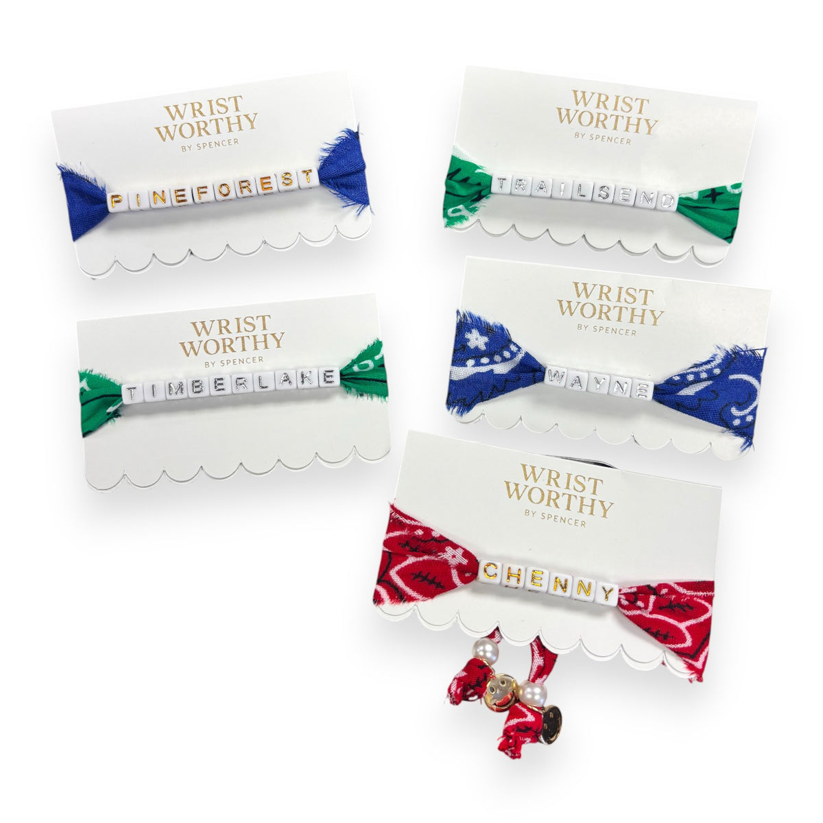 Five Wrist Worthy camp name bracelets with letter beads on blue, green and red bandana fabric, including Wayne and Chenny