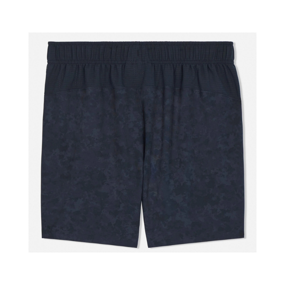 Navy tonal camo athletic shorts with GOAT logo, back view showing elastic waistband and subtle camouflage pattern