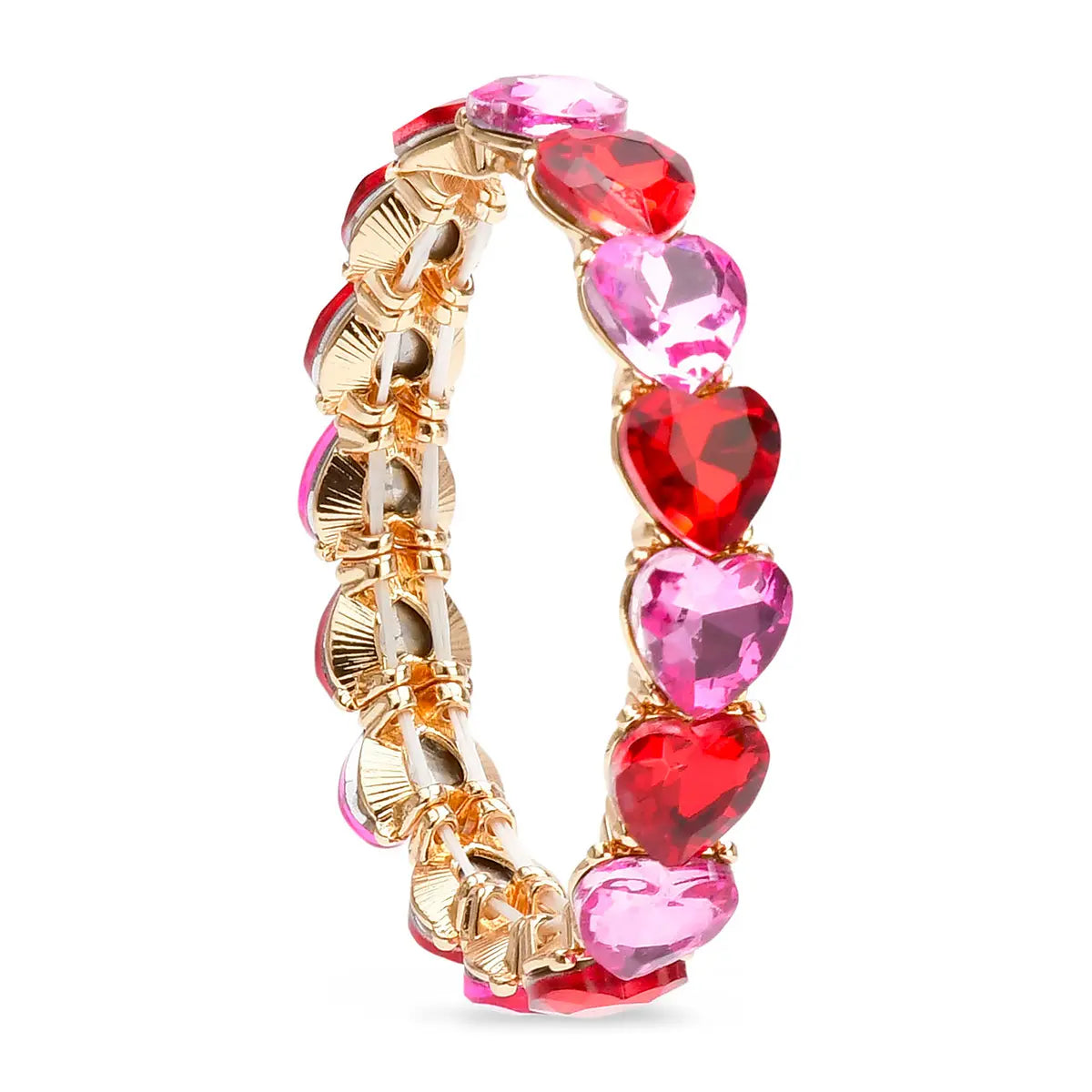Red and pink heart stretch bracelet standing upright showing gold-tone hardware and alternating heart-shaped gemstones