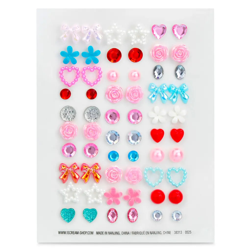 Sheet of sparkly stick-on earrings with bows, hearts, stars, flowers and gems in pink, red and blue