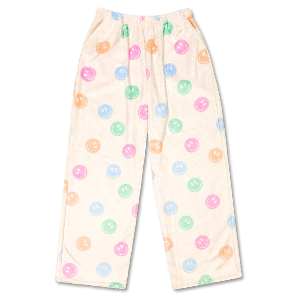 Made You Smile cream plush pants with colorful neon smiley faces in pink, orange, blue and green scattered all over
