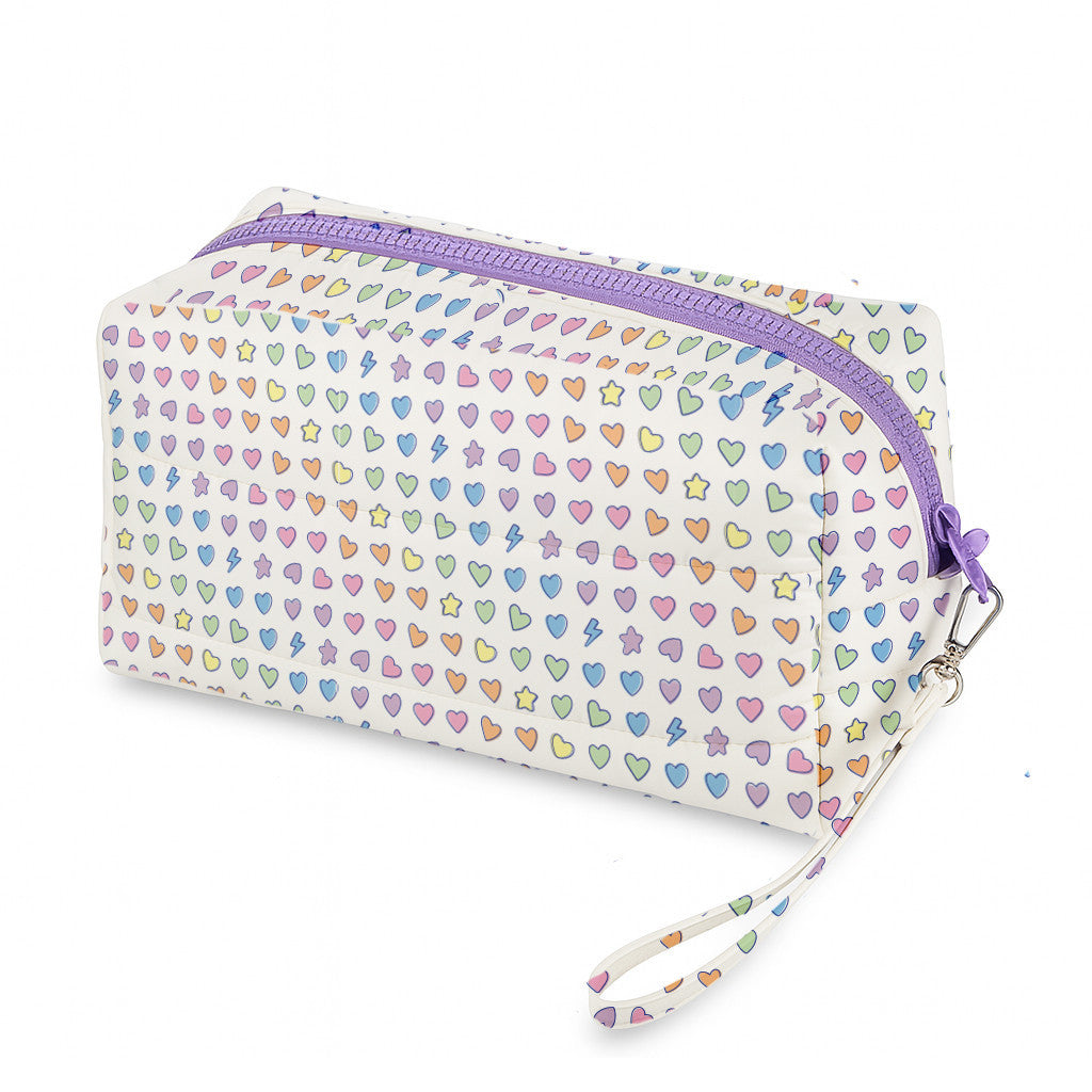 Rainbow Remix puffer cosmetic bag with a lavender zipper and pastel hearts, stars and lightning bolts