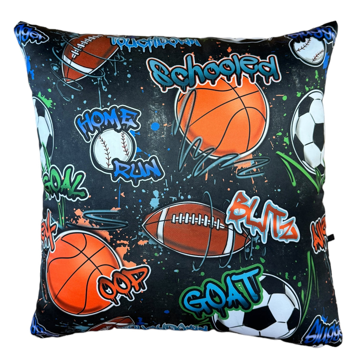 Street Sports Autograph Pillow with black background featuring orange basketballs, brown footballs, white baseballs, and soccer balls with colorful graffiti-style text including Goal, Touchdown, Home Run and Swoosh