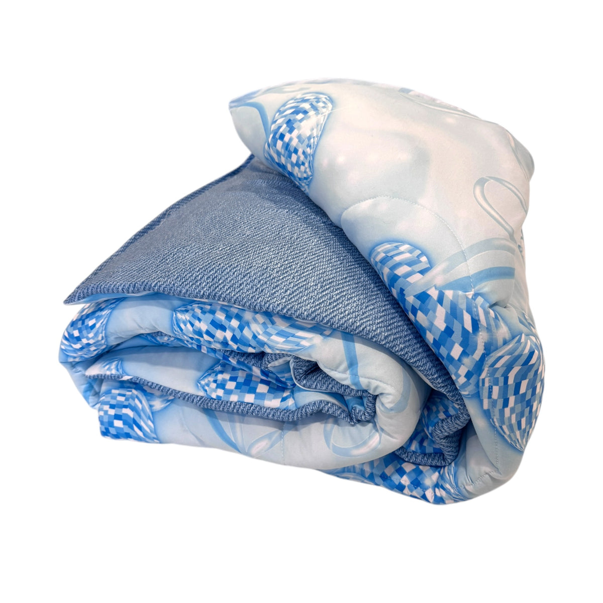 Denim and Diamonds reversible camp comforter rolled up showing blue disco cherry pattern and denim sides