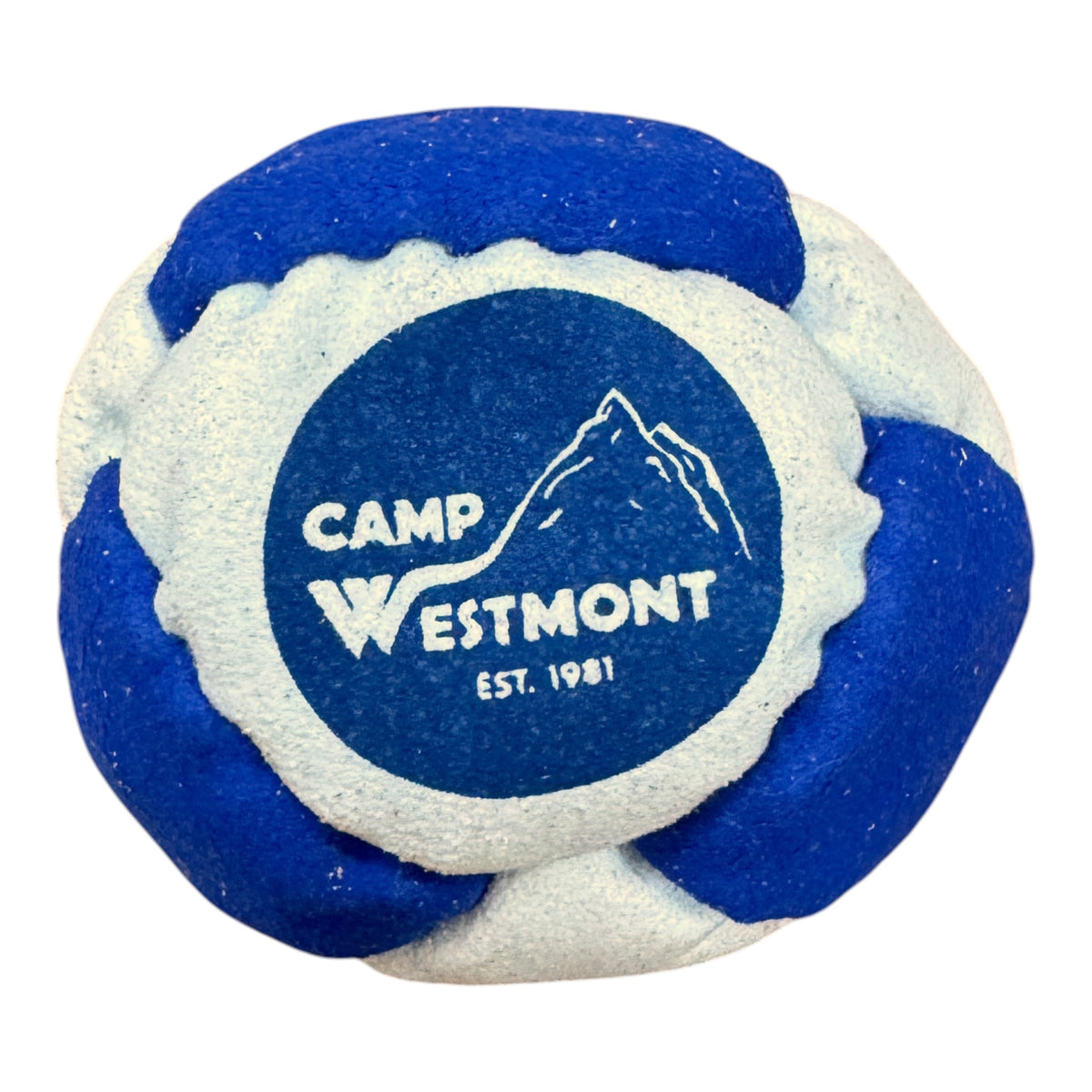 Close-up of Camp Green Lane hacky sack in green and beige with tent logo and EST. 1926 text
