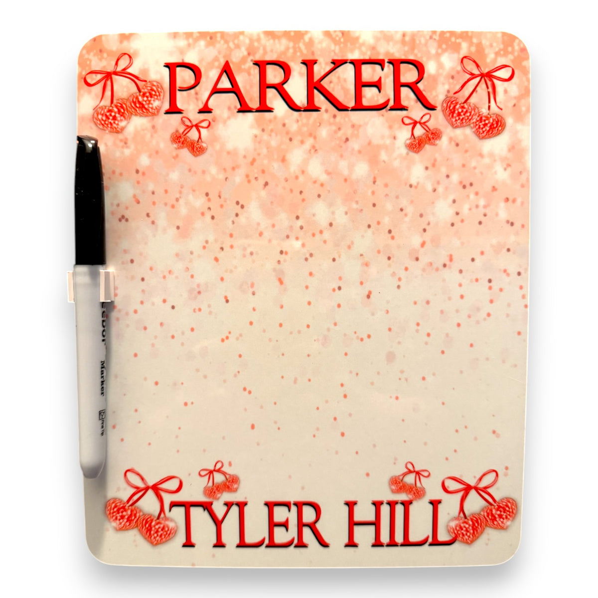 Disco Cherries dry erase board with sparkly peach background featuring red disco ball cherries with bows and text reading PARKER at top and TYLER HILL at bottom