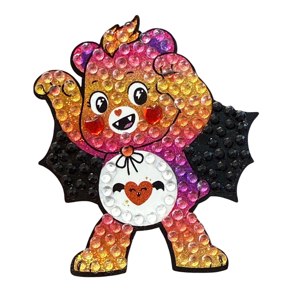 Spooky Sparkle Bear StickerBean: rhinestone sticker of a bear with bat wings and a heart on its belly