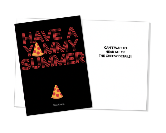 Black greeting card with red text reading HAVE A YUMMY SUMMER with pizza slice emoji graphics and matching pizza slice shoe charm, packaged with white envelope