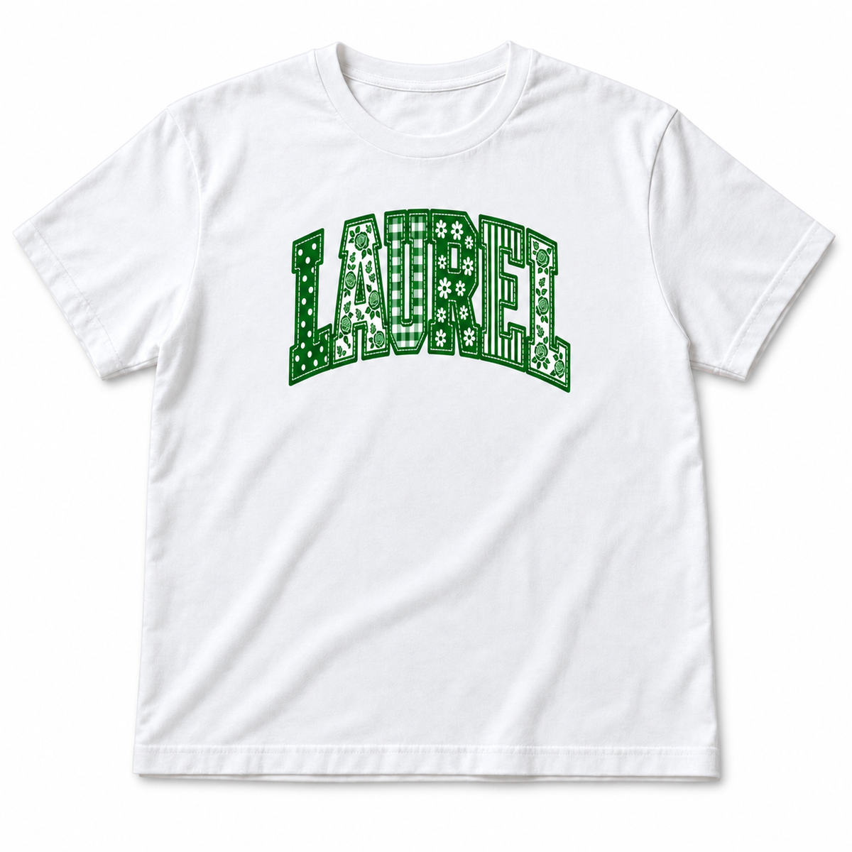 Coquette Letters Tee in white with LAUREL in green and white patchwork varsity letters