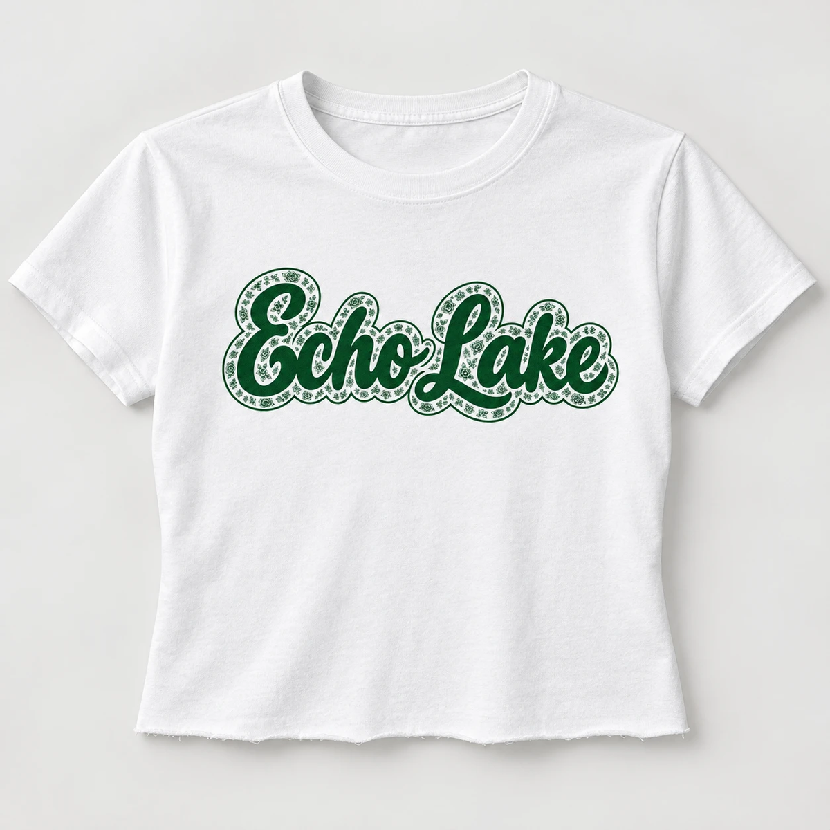 Toile Script Camp Tee, white cropped tee with Echo Lake in green script and toile rose outline