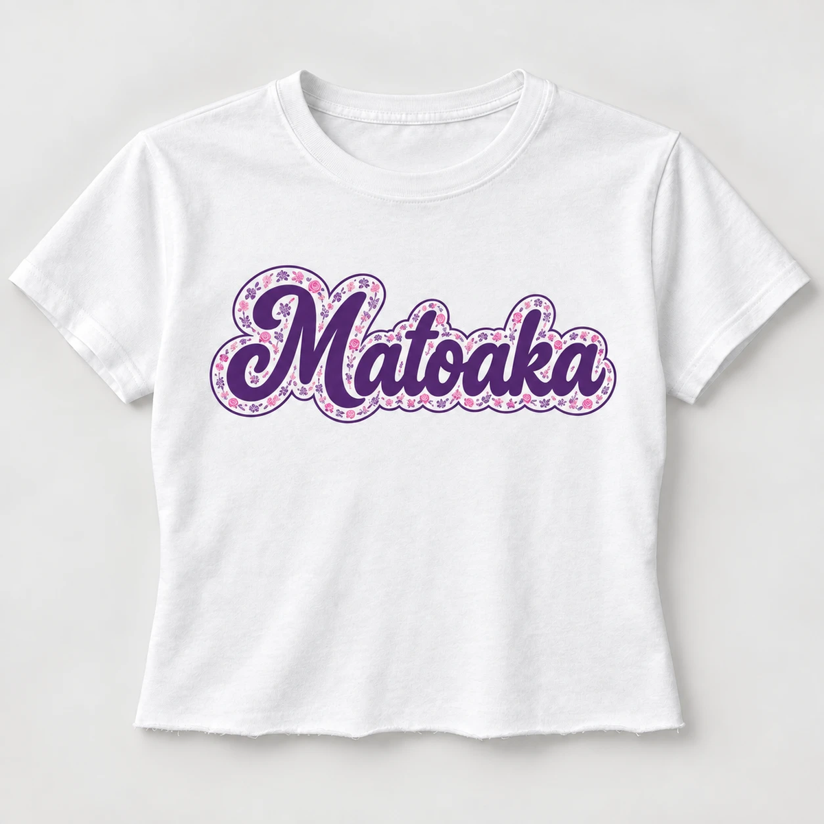 Toile Script Camp Tee, white cropped tee with Matoaka in purple script and pink toile rose outline