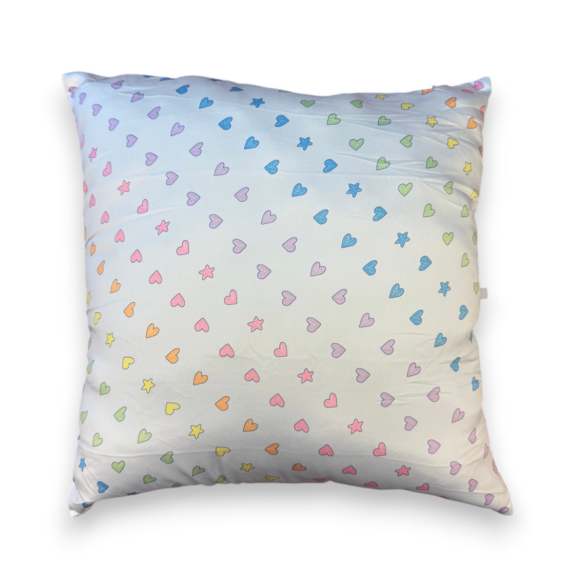 Rainbow Remix Autograph Pillow with gradient rainbow hearts and stars pattern on white background, perfect for camp bunk signatures