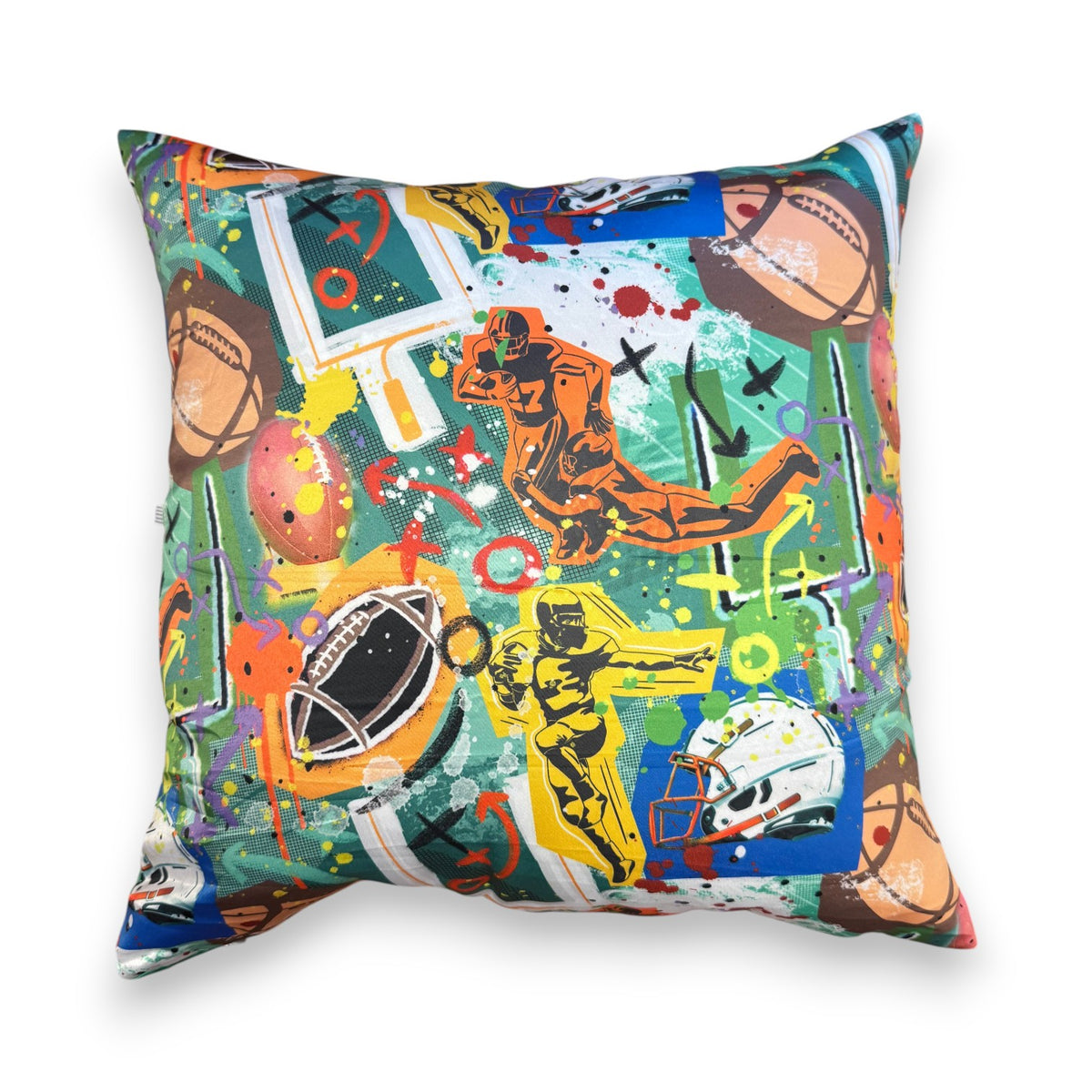 Square pillow in a graffiti football print with players, helmets and goalposts