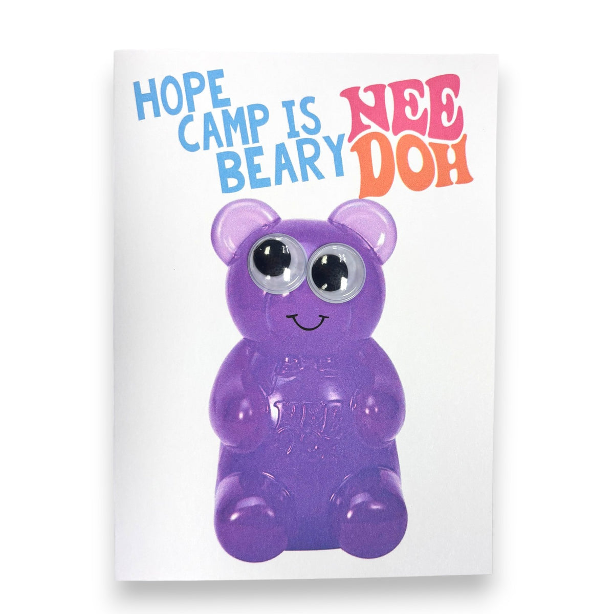 Beary Nee Doh greeting card with purple squishy bear toy featuring wiggly googly eyes and text reading Hope Camp is Beary Nee Doh in blue pink and orange lettering
