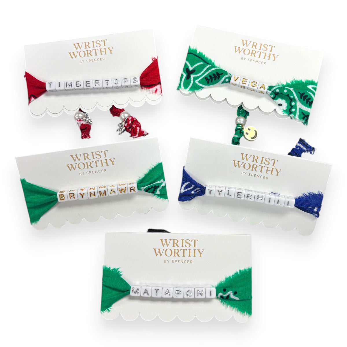 Five Wrist Worthy camp name bracelets with white letter beads on red, green and blue bandana fabric