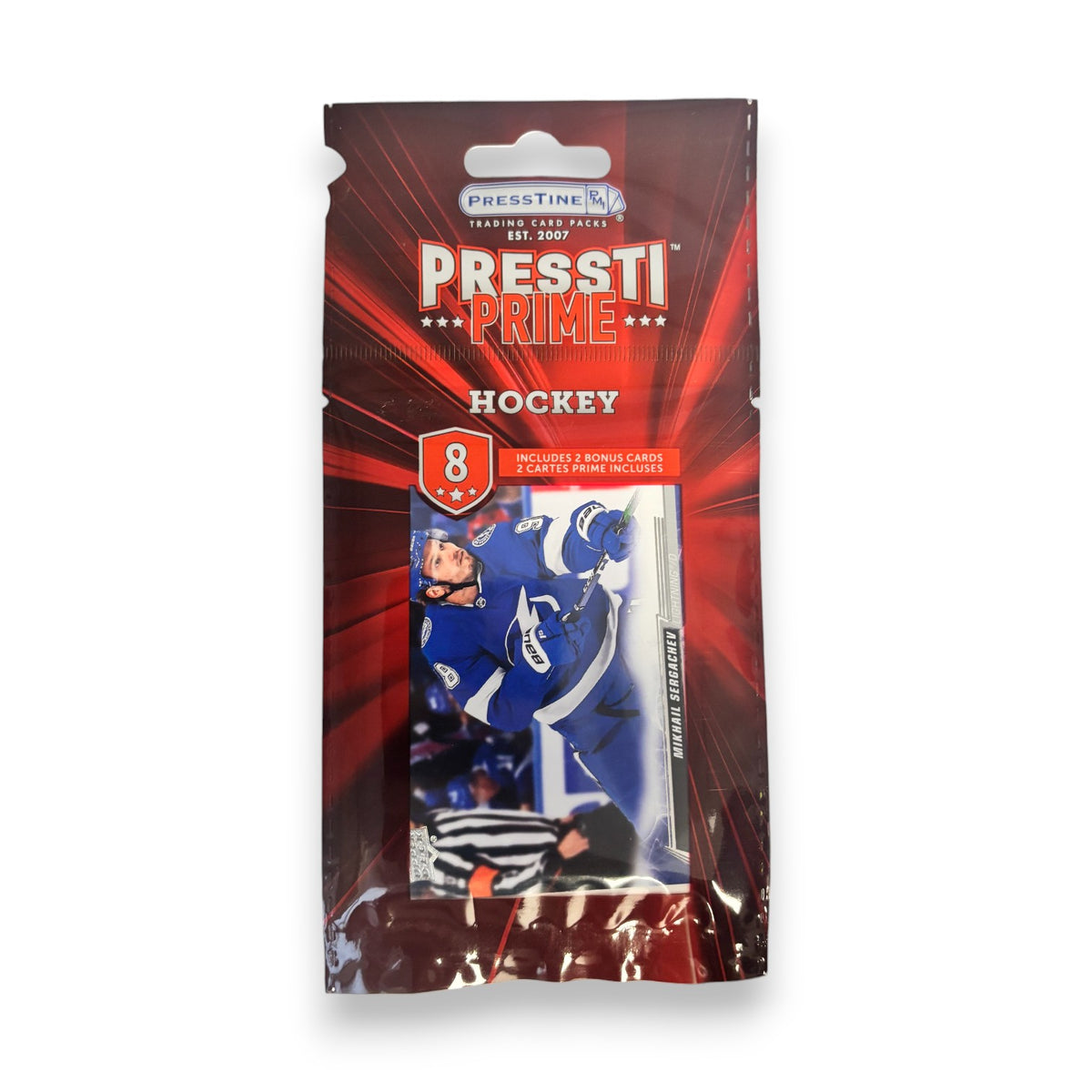 Pressti Prime hockey trading card pack in red foil packaging with a Tampa Bay player card