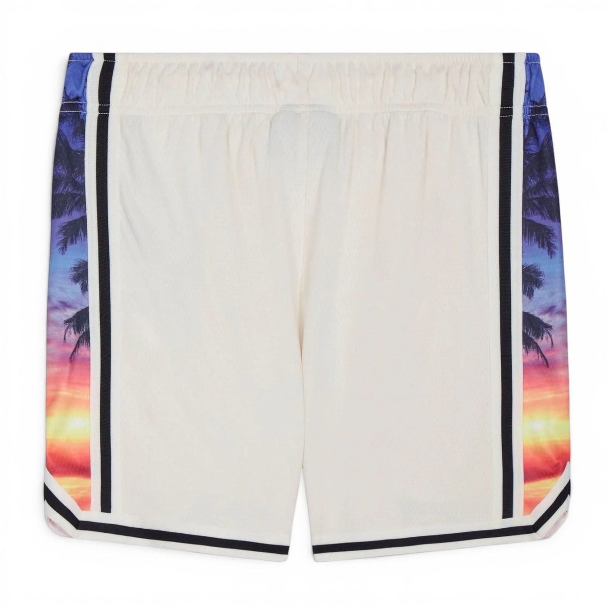 Back view of GOAT Palm Tree Mesh Shorts showing cream body with tropical sunset palm tree panels on sides and curved black striped hem detail