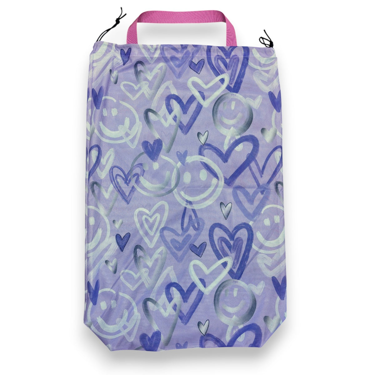 Mesh laundry bag in lavender with purple graffiti hearts and smiley faces and a pink handle