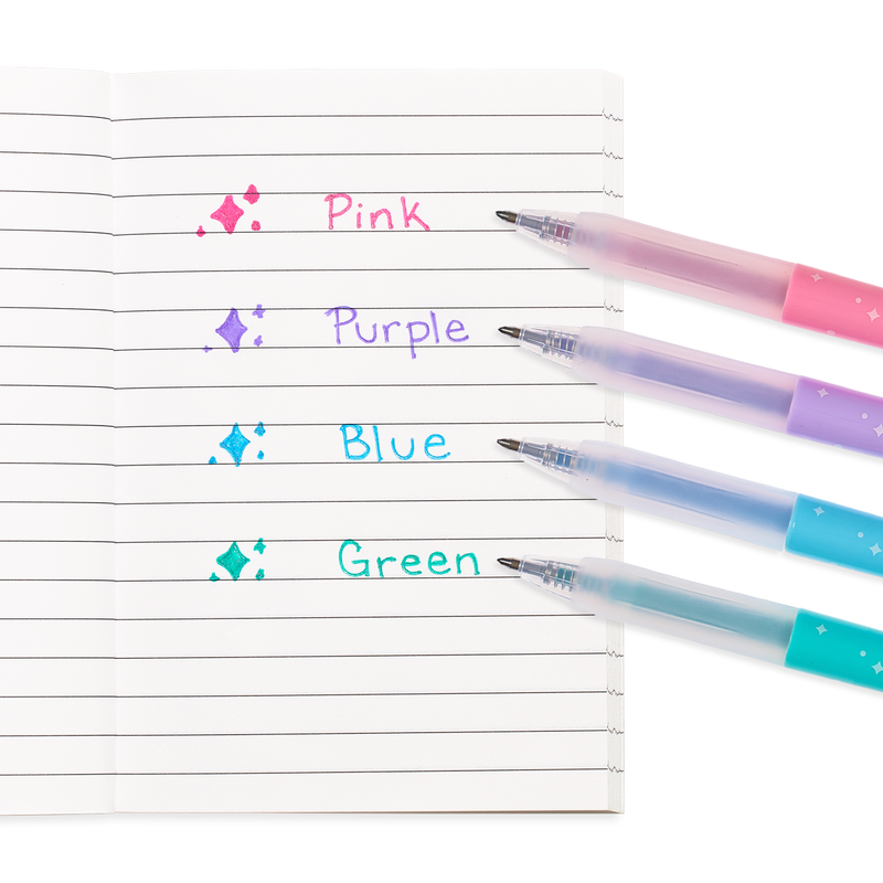 Four Oh My Glitter retractable gel pens writing in pink purple blue and green glitter ink on lined paper with sparkle accents